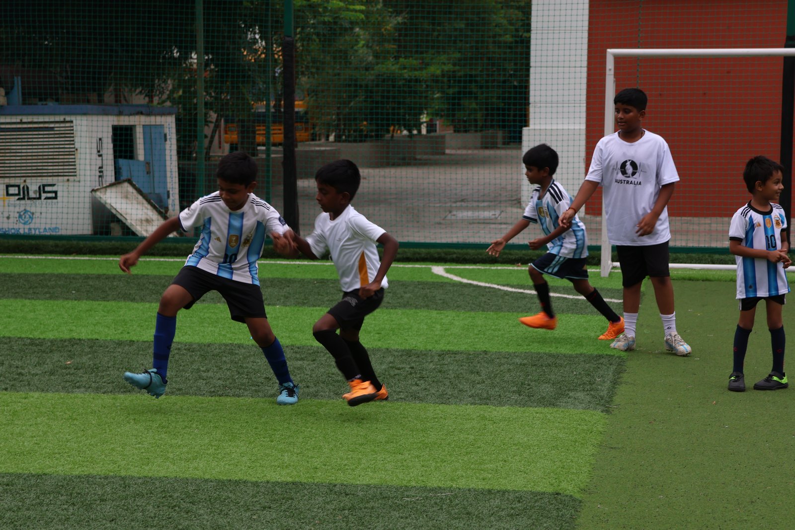 MVM students playing football on the school turf